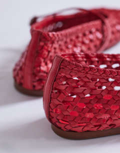 Model wearing Bobbi leather woven ballet in red