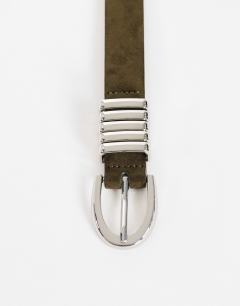 Model wearing Bobbi suedette multi keeper belt in khaki