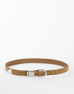 Model wearing Bobbi suedette multi keeper belt in sand