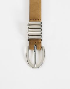 Model wearing Bobbi suedette multi keeper belt in sand