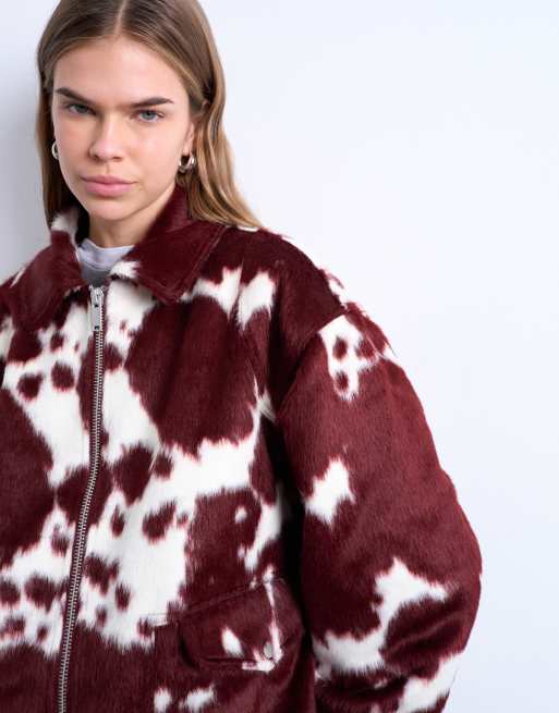 Topshop faux fur cow print bomber jacket