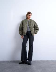 Model wearing Bomber with contrast lining in green 