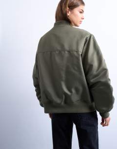 Model wearing Bomber with contrast lining in green 