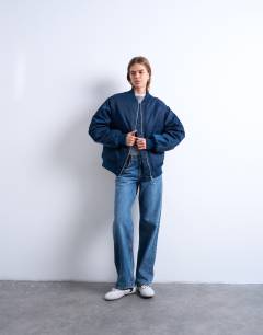 Model wearing Bomber with contrast lining in navy