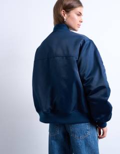 Model wearing Bomber with contrast lining in navy