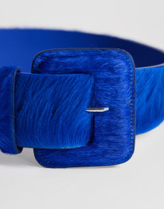 Model wearing Bonnie hair on real leather belt in cobalt