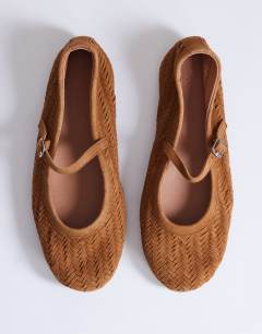 Model wearing Bonnie real suede woven ballet in tan