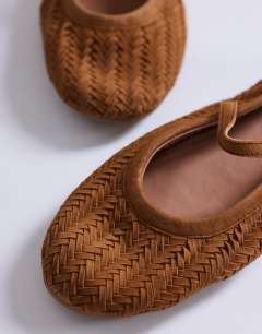 Model wearing Bonnie real suede woven ballet in tan