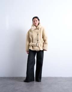 Model wearing Borg belted short car coat in cream