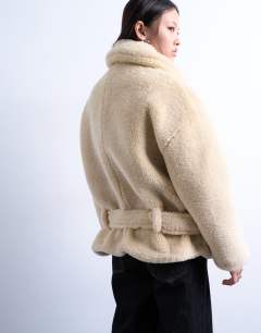 Model wearing Borg belted short car coat in cream