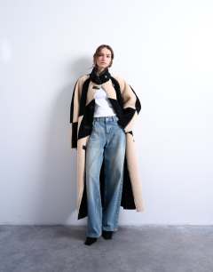 Borg longline ovoid sleeve patchwork coat in black