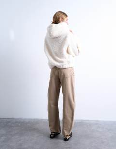 Model wearing Borg oversized hoodie in cream
