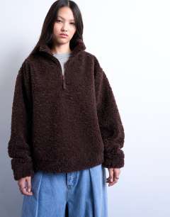 Model wearing Borg quarter zip top in dark brown