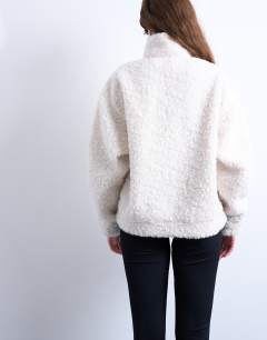 Model wearing Borg quarter zip top in ecru