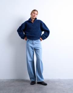 Model wearing Borg quarter zip top in navy