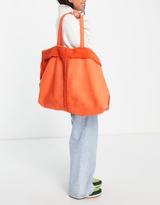 Topshop borg shearling mix tote in orange