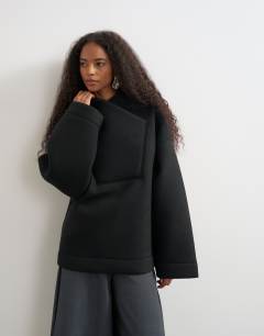 Model wearing Borg wrap neck sweat in black