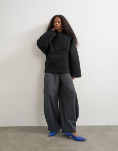Model wearing Borg wrap neck sweat in black