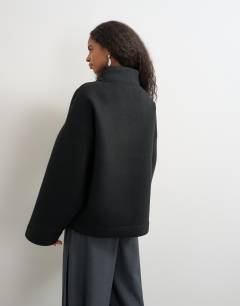 Model wearing Borg wrap neck sweat in black