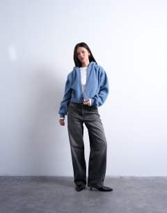 Model wearing Borg zip through hoodie in blue