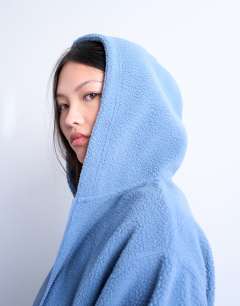 Model wearing Borg zip through hoodie in blue