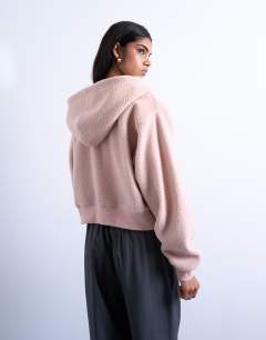 Model wearing Borg zip through hoodie in pink
