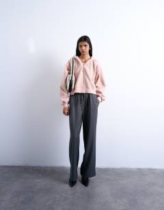 Model wearing Borg zip through hoodie in pink