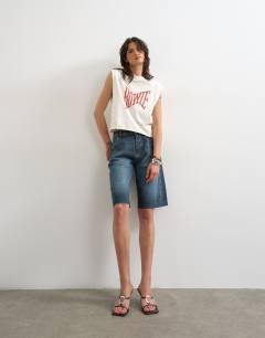 Model wearing Bowie graphic tank in ivory