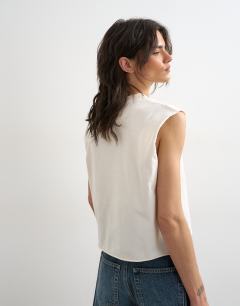 Model wearing Bowie graphic tank in ivory