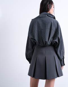 Model wearing Box pleat grey mini skirt