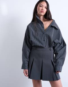 Model wearing Box pleat grey mini skirt