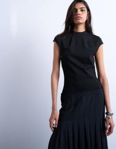 Model wearing Box pleat skirt dropped waist maxi dress in black