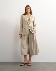 Model wearing Boyfriend single breasted blazer in beige