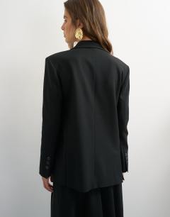 Model wearing Boyfriend single breasted blazer in black