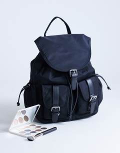 Model wearing Bradley large nylon & pu backpack with pockets in black