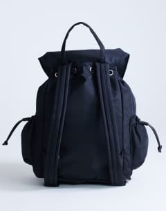 Model wearing Bradley large nylon & pu backpack with pockets in black