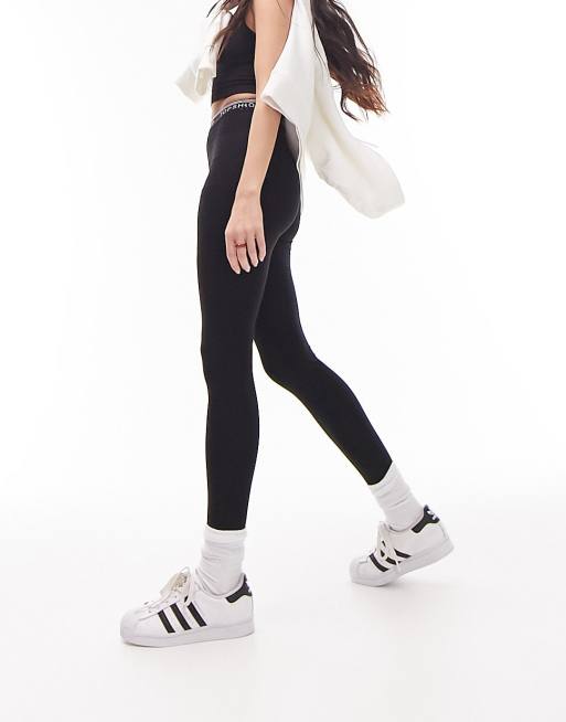 Topshop branded elasticized leggings in black