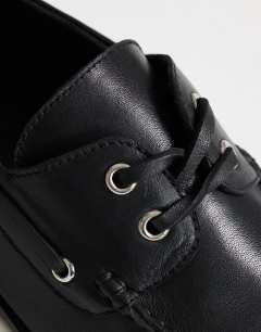 Model wearing Brandi leather lace up shoe in black