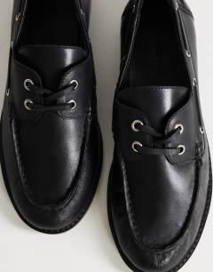 Model wearing Brandi leather lace up shoe in black