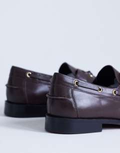 Model wearing Brandi leather lace up shoe in chocolate