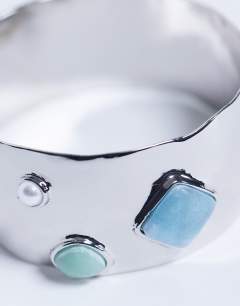 Model wearing Bree large bangle bracelet with stones in silver