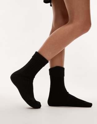 Topshop - Breit gerippte Socken in Schwarz mit Umschlag