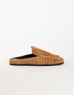 Model wearing Brianna real suede ruched mule in tan