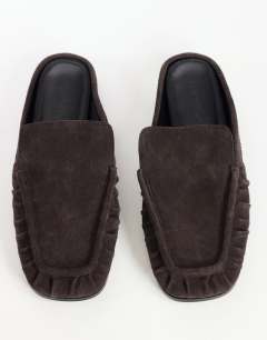 Model wearing Brianna real suede ruched mule loafer in chocolate