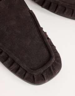 Model wearing Brianna real suede ruched mule loafer in chocolate