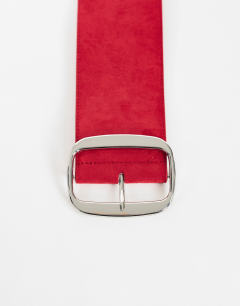 Model wearing Brittany suedette wide belt in red
