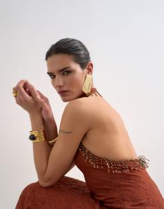Model wearing Broderie occasion maxi dress with beaded trim in rust