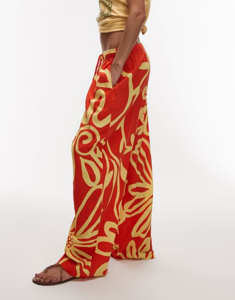 Topshop - Broek van linnenmix met ballonpijpen en abstracte bloemenprint in feloranje - view 1