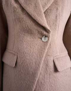 Model wearing Brushed ovoid sleeve cinch waist blazer coat in camel