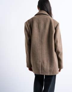 Model wearing Brushed three button blazer coat in camel